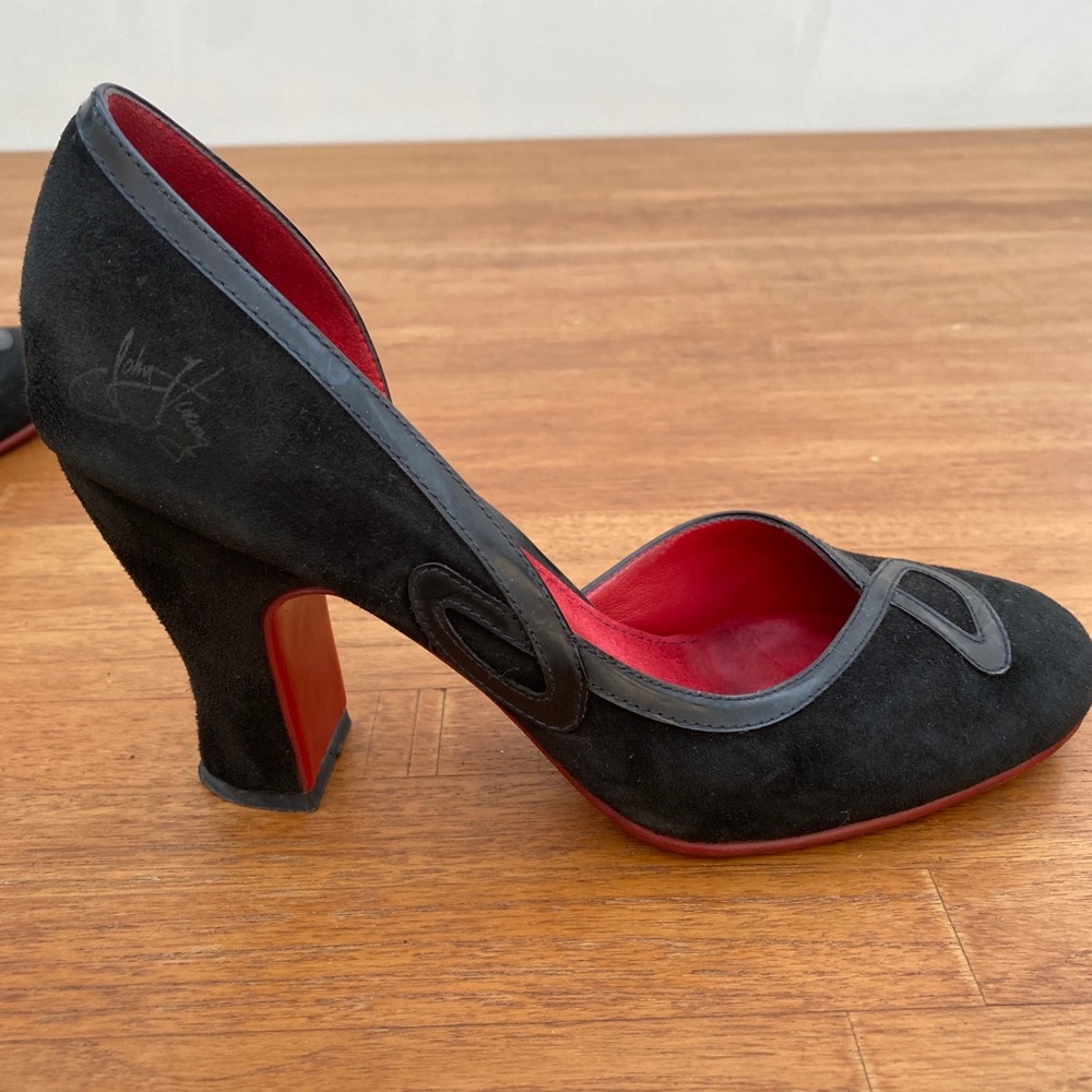 John Fluevog black suede heels. Size 7. Slightly worn but very good condition.
